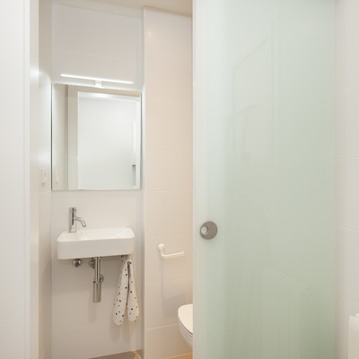 Puerta corredera aseo | Sincro