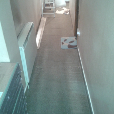 Lavado De Cara A Un Pasillo, Colocación De Tarima Y Puertas