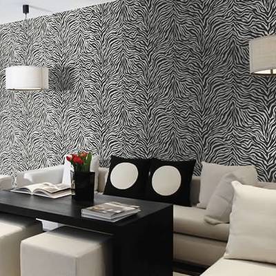 Revestimiento vinílico sobre gotelé en pared de salónsalón