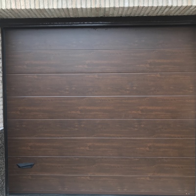 Puerta seccional con motor shellkit75