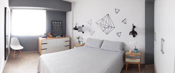 Habitación retro en tonos blanco y gris