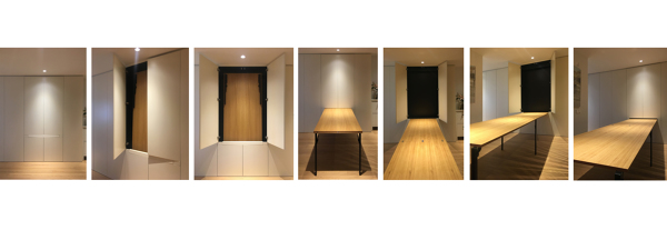 Mesa desplegable XXL oculta en armario.