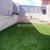 Instalación de césped artificial y creación de jardinera perimetral
