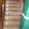 Forrado de escalera con laminado de Quick Step