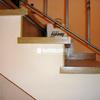 Forrado de escalera con laminado de Quick Step