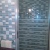Alicatado de baño y montaje de mampara