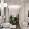 Baño blanco con planta rectangular y ladrillo metro