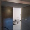 Baño con un altillo de pladur