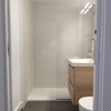 Baño terminado con puerta Corredera empotrada