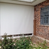 Cortina enrollable de Polyscreen 5% guiada exterior