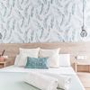 Dormitorio con papel pintado