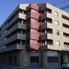 Edificio de viviendas, locales comerciales y aparcamiento.