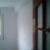 Entrada de una habitación ya tratada sin gotelé y pintada