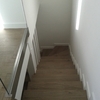 ESCALERA QUE COMUNICA PRIMER PISO Y PLANTA BAJA