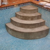 Escalera redonda de piscina.