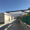 FORMACION DE PERGOLA CON ESTRUCTURA DE ALUMINIO Y PANEL SANDWICH