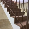 Forrado de escalera con laminado en Roble Teñido