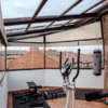 Gimnasio en cerramiento de la terraza