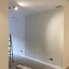 Instalacion de papel en tienda de ropa