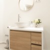 El nuevo baño de M y Lola por emmme studio:  Lavabo con mueble