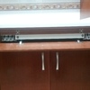 Mesa oculta tras frente de cajón de 15*90 cm, con guías telescópicas aluminio.