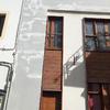 Pintura exterior de fachada y superficies de madera ventanas y puertas