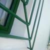 Pintura exterior de vivienda ventanas de hierro