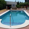 PISCINA CON ESCALERA EXTERIOR