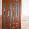 Puerta de entrada en PVC nogal