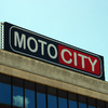 Rótulo luminoso con frontal de lona - Motocity Mallorca