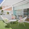 Terraza con cortina de cristal