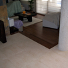 Vivienda Particular:  valla, parquet interior y tarima exterior.